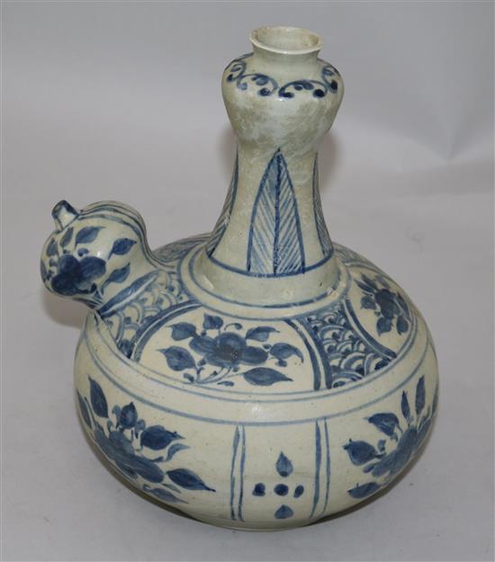 An Annamese blue and white porcelain kendi, 15th century, 23cm, sea-etched glaze